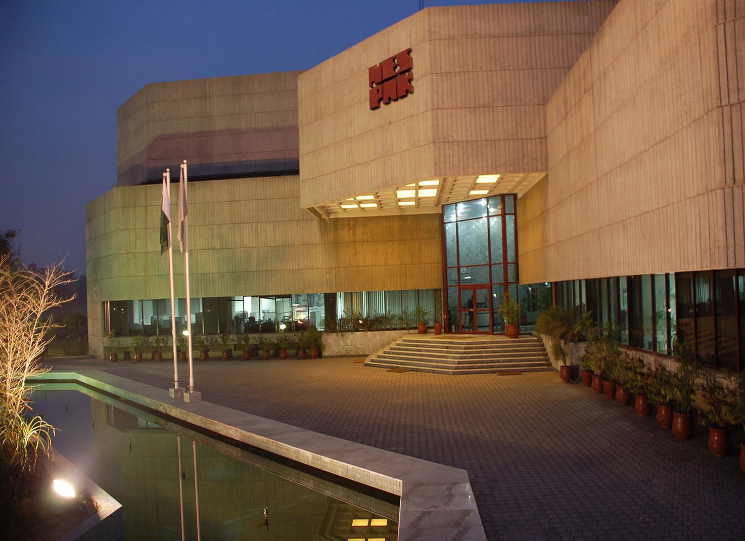NESPAK head office building at night